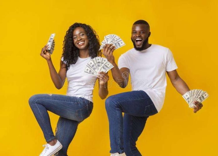 african-american-cheerful-couple-dancing-money-their-hands-lifting-legs-up-black-156762964 african-american-cheerful-couple-dancing-money-their-hands-lifting-legs-up-black-156762964